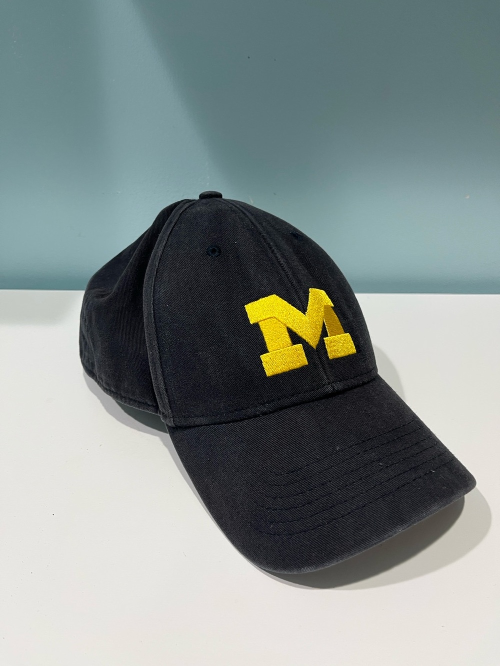 Michigan Men's Black Baseball Cap with Yellow 'M' Embroidered Patch